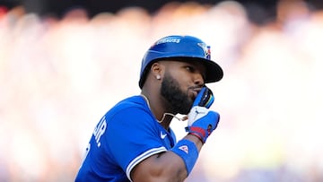 TORONTO, ONTARIO - OCTOBER 05: Vladimir Guerrero Jr. #27 of the Toronto Blue Jays celebrates after a grand slam during the fourth inning in game two of the American League Division Series against the New York Yankees at Rogers Centre on October 05, 2025 in Toronto, Ontario. Mark Blinch/Getty Images/AFP (Photo by MARK BLINCH / GETTY IMAGES NORTH AMERICA / Getty Images via AFP)