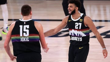 LAKE BUENA VISTA, FLORIDA - SEPTEMBER 13: Jamal Murray #27 of the Denver Nuggets and Nikola Jokic #15 of the Denver Nuggets react during the fourth quarter against the LA Clippers in Game Six of the Western Conference Second Round during the 2020 NBA Playoffs at AdventHealth Arena at the ESPN Wide World Of Sports Complex on September 12, 2020 in Lake Buena Vista, Florida. NOTE TO USER: User expressly acknowledges and agrees that, by downloading and or using this photograph, User is consenting to the terms and conditions of the Getty Images License Agreement.   Michael Reaves/Getty Images/AFP
 == FOR NEWSPAPERS, INTERNET, TELCOS &amp; TELEVISION USE ONLY ==