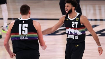 LAKE BUENA VISTA, FLORIDA - SEPTEMBER 13: Jamal Murray #27 of the Denver Nuggets and Nikola Jokic #15 of the Denver Nuggets react during the fourth quarter against the LA Clippers in Game Six of the Western Conference Second Round during the 2020 NBA Playoffs at AdventHealth Arena at the ESPN Wide World Of Sports Complex on September 12, 2020 in Lake Buena Vista, Florida. NOTE TO USER: User expressly acknowledges and agrees that, by downloading and or using this photograph, User is consenting to the terms and conditions of the Getty Images License Agreement. Michael Reaves/Getty Images/AFP
== FOR NEWSPAPERS, INTERNET, TELCOS & TELEVISION USE ONLY ==