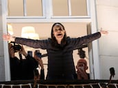 Nobel Peace Prize laureate Maria Corina Machado reacts from a balcony of Grand Hotel, after her daughter Ana Corina Sosa Machado, accepted the award on her behalf, in Oslo, Norway December 11, 2025. REUTERS/Leonhard Foeger
