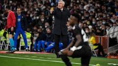 Real Madrid&#039;s Italian coach Carlo Ancelotti gestures during the Spanish League football match between Real Madrid CF and FC Barcelona at the Santiago Bernabeu stadium in Madrid on March 20, 2022. (Photo by PIERRE-PHILIPPE MARCOU / AFP)