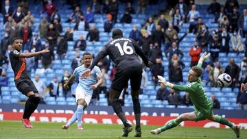 Manchester City&#039;s Gabriel Jesus shoots to score his side&#039;s second goal during the English Premier League soccer match between Manchester City and Everton at the Etihad stadium in Manchester, Sunday, May 23, 2021.(AP Photo/Dave Thompson, Pool)