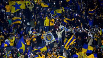 Tigres' fans cheer for their team during the Liga MX Clausura football match between Tigres and Tijuana at the Universitario (UANL) Stadium in San Nicolas de los Garza, Nuevo Leon State, Mexico on January 28, 2025. (Photo by Julio Cesar AGUILAR / AFP)