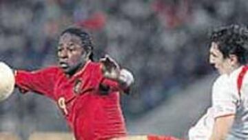 <b>CONEXIÓN. </b>Bak y Mpenza, en la foto, son compañeros en Qatar.