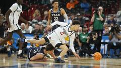 San Diego State Aztecs guard Miles Byrd (21) topples over Yale Bulldogs guard August Mahoney (3) in the second half at Spokane Veterans Memorial Arena.