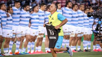 An official from the Argentina team carries an All Blackx92s jersey with the name Maradona and the number ten printed on it, as a tribute to the late Argentinian footballer, before the start of the 2020 Tri-Nations rugby match between New Zealand and Argentina at the McDonald Jones Stadium in Newcastle on November 28, 2020. (Photo by DAVID GRAY / AFP) / -- IMAGE RESTRICTED TO EDITORIAL USE - STRICTLY NO COMMERCIAL USE --