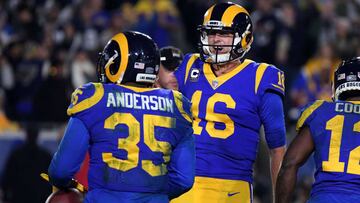 LOS ANGELES, CA - JANUARY 12: C.J. Anderson #35 of the Los Angeles Rams celebrates wil Jared Goff #16 after a 1 yard touchdown run in the fourth quarter against the Dallas Cowboys in the NFC Divisional Playoff game at Los Angeles Memorial Coliseum on January 12, 2019 in Los Angeles, California. Harry How/Getty Images/AFP
== FOR NEWSPAPERS, INTERNET, TELCOS & TELEVISION USE ONLY ==