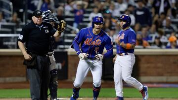 NEW YORK, NEW YORK - JUNE 14: Brandon Nimmo #9 of the New York Mets reacts after he was hit by a pitch during the seventh inning against the New York Yankees with the bases loaded scoring teammate Francisco Alvarez #4 at Citi Field on June 14, 2023 in New York City.   Jim McIsaac/Getty Images/AFP (Photo by Jim McIsaac / GETTY IMAGES NORTH AMERICA / Getty Images via AFP)