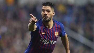 Luis Suárez jugando con el Barcelona
