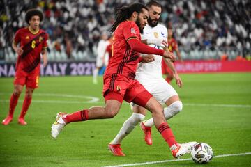 Jason Denayer y Karim Benzema.