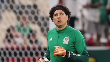 (FILES) Mexico's goalkeeper #13 Guillermo Ochoa warms up ahead of the Qatar 2022 World Cup Group C football match between Saudi Arabia and Mexico at the Lusail Stadium in Lusail, north of Doha on November 30, 2022. Forty-year-old Mexican goalkeeper Guillermo Ochoa has reached an agreement with Limassol in Cyprus to play for them in the 2025-2026 season as soon as he submits the tests that prove he is in optimal health. (Photo by KARIM JAAFAR / AFP)