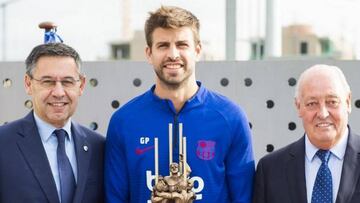 Piqu&eacute;, con el premio Aldo Rovira.