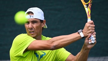 Spain's Rafael Nadal eyes the ball as he returns it during a training session during the 2022 Wimbledon Championships at The All England Tennis Club in Wimbledon, southwest London, on June 26, 2022. (Photo by Glyn KIRK / AFP) / RESTRICTED TO EDITORIAL USE