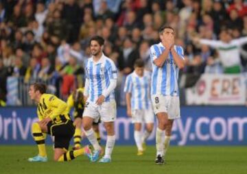 El M&aacute;laga y el Borussia de Dortmund empataron (2-2) en el partido de ida de cuartos de final disputado en La Rosaleda. La eliminatoria queda abierta para la vuelta. 