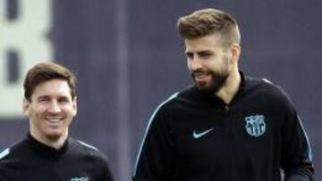 Piqué, junto a Messi y Luis Suárez.