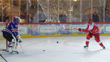 Vladimir Putin took part in the traditional Christmas day ice hockey exhibition match in Red Square and led his side to victory, scoring eight times in an 8-5 victory, according to the Associated Press and Reuters, although the Kremlin match report credit