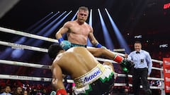 LAS VEGAS, NEVADA - MAY 04: Canelo Alvarez knocks down Jaime Munguia in their super middleweight championship title fight at T-Mobile Arena on May 04, 2024 in Las Vegas, Nevada.   Christian Petersen/Getty Images/AFP (Photo by Christian Petersen / GETTY IMAGES NORTH AMERICA / Getty Images via AFP)