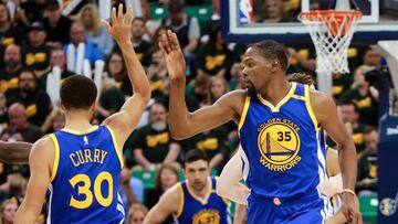 May 6, 2017; Salt Lake City, UT, USA; Golden State Warriors forward Kevin Durant (35) and Golden State Warriors guard Stephen Curry (30) celebrate after Durant scores against the Utah Jazz during the third quarter in game three of the second round of the 2017 NBA Playoffs at Vivint Smart Home Arena. Mandatory Credit: Chris Nicoll-USA TODAY Sports