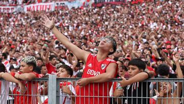 Fans of River Plate cheer for their team before the start of the Argentine Professional Football League Cup 2024 match between River Plate and Boca Juniors at El Monumental stadium in Buenos Aires on February 25, 2024. (Photo by ALEJANDRO PAGNI / AFP)