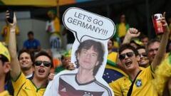 Los carteles, fotos y m&aacute;scaras de Mick Jagger fueron tendencia en todos los estadios del Mundial de Brasil 2014