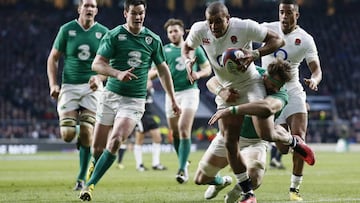 Jamie Heaslip tackles Jonathan Joseph