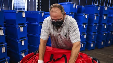 CHARLOTTE, NC - NOVEMBER 04: An elections specialist packs up bags in a room filled with counted ballots the day after the election at the Mecklenburg County Board of Elections office on November 4, 2020 in Charlotte, North Carolina. The presidential race