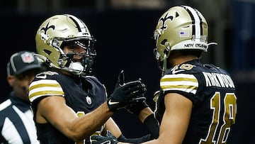 NEW ORLEANS, LOUISIANA - DECEMBER 10: Keith Kirkwood #18 of the New Orleans Saints and Chris Olave #12 of the New Orleans Saints celebrate a touchdown during the fourth quarter against the Carolina Panthers at Caesars Superdome on December 10, 2023 in New Orleans, Louisiana.   Chris Graythen/Getty Images/AFP (Photo by Chris Graythen / GETTY IMAGES NORTH AMERICA / Getty Images via AFP)