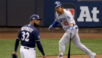 (FILES) In this file photo taken on October 13, 2018 Justin Turner #10 of the Los Angeles Dodgers hits a two run home run against Jeremy Jeffress #32 of the Milwaukee Brewers during the eighth inning in Game Two of the National League Championship Series at Miller Park in Milwaukee, Wisconsin. - Justin Turner&#039;s two-run homer in the eighth inning lifted the Los Angeles Dodgers to a 4-3 victory over the Milwaukee Brewers October 13, 2018 that knotted their Major League Baseball playoff series at one game each. Turner&#039;s blast off Brewers relief pitcher Jeremy Jeffress gave the Dodgers the lead for the first time in front of a crowd of 43,900 at Miller Park in Milwaukee. (Photo by Dylan Buell / GETTY IMAGES NORTH AMERICA / AFP)