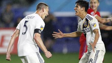 CARSON, CALIFORNIA - MARCH 02: Daniel Steres #5 of Los Angeles Galaxy celebrates his goal with Uriel Antuna #18 in the second half against the Chicago Fire at Dignity Health Sports Park on March 02, 2019 in Carson, California.   Meg Oliphant/Getty Images/AFP
 == FOR NEWSPAPERS, INTERNET, TELCOS &amp; TELEVISION USE ONLY ==