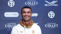 Al-Nassr's Cristiano Ronaldo smiles during a press conference in Osaka on July 23, 2023. Saudi Arabia's Al-Nassr are in Japan to play friendly matches against France's Paris Saint-Germain and Italy's Inter Milan. (Photo by PAUL MILLER / AFP)