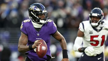 BALTIMORE, MARYLAND - JANUARY 20: Quarterback Lamar Jackson #8 of the Baltimore Ravens looks to pass against the Houston Texans during the AFC Divisional Playoff game at M&T Bank Stadium on January 20, 2024 in Baltimore, Maryland.   Rob Carr/Getty Images/AFP (Photo by Rob Carr / GETTY IMAGES NORTH AMERICA / Getty Images via AFP)