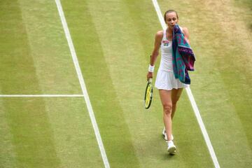 Slovakia's Magdalena Rybarikova reacts against Spain's Garbine Muguruza during their women's singles semi-final match