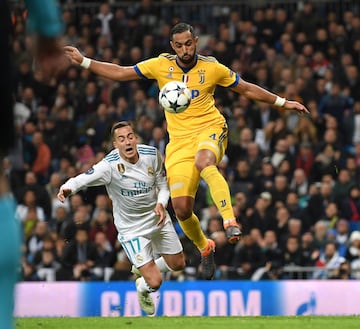 Medhi Benatia of Juventus fouls Lucas Vazquez of Real Madrid, leading to a penalty being awarded during the UEFA Champions League Quarter Final Second Leg match between Real Madrid and Juventus.