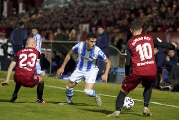 Merino entre Gudiri y Álvaro Rey.