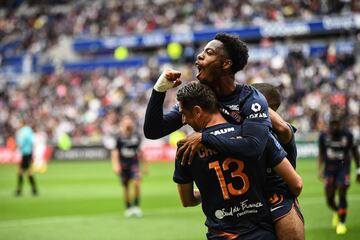 Montpellier's French forward Elye Wahi celebrates scoring his team's first goal during the French L1 football match between Olympique Lyonnais (OL) and Montpellier Herault SC at The Groupama Stadium in Decines-Charpieu, central-eastern France on May 7, 2023. (Photo by OLIVIER CHASSIGNOLE / AFP)