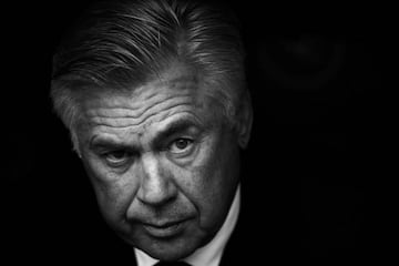 It's black and white | Carlo Ancelotti head coach of Bayern Munich sits on the bench during the Bundesliga match between Bayern and FC Augsburg.