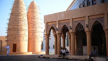 Men leave the Katara mosque in Katara Cultural Village, in Doha on November 16, 2022, ahead of the Qatar 2022 World Cup football tournament (Photo by Anne-Christine POUJOULAT / AFP)