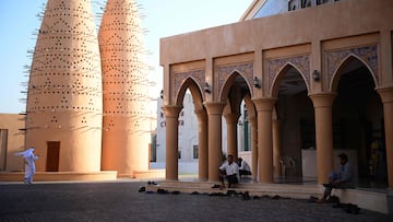 Men leave the Katara mosque in Katara Cultural Village, in Doha on November 16, 2022, ahead of the Qatar 2022 World Cup football tournament (Photo by Anne-Christine POUJOULAT / AFP)