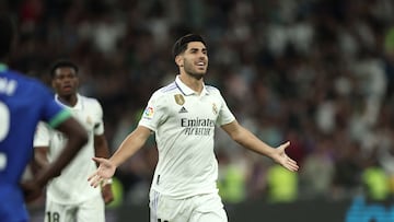 Real Madrid's Spanish midfielder Marco Asensio celebrates scoring his team's first goal during the Spanish league football match between Real Madrid CF and Getafe CF at the Santiago Bernabeu stadium in Madrid on May 13, 2023. (Photo by Thomas COEX / AFP)