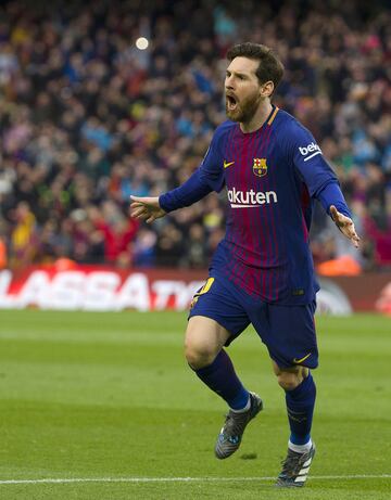 Leo Messi celebrates after scoring.