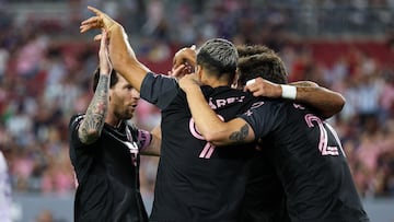 Feb 14, 2025; Tampa, FL, USA; Inter Miami CF midfielder Tadeo Allende (21) celebrates with forward Luis Suarez (9) and forward Lionel Messi (10) after scoring a goal against Orlando City in the first half at Raymond James Stadium. Mandatory Credit: Nathan Ray Seebeck-Imagn Images