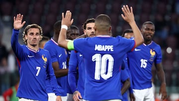 France's midfielder #07 Antoine Griezmann (L) and France's forward #10 Kylian Mbappe gesture during the International friendly football match between France and Luxembourg at Saint-Symphorien Stadium in Longeville-les-Metz, eastern France, on June 5, 2024. (Photo by FRANCK FIFE / AFP)