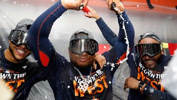 HOUSTON, TEXAS - SEPTEMBER 24: Jeremy Pena #3 and Framber Valdez #59 of the Houston Astros celebrate in the locker room after winning the AL West Division by defeating the Seattle Mariners at Minute Maid Park on September 24, 2024 in Houston, Texas. Tim Warner/Getty Images/AFP (Photo by Tim Warner / GETTY IMAGES NORTH AMERICA / Getty Images via AFP)