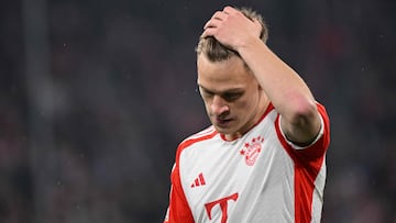 Bayern Munich's German midfielder #06 Joshua Kimmich reacts during the UEFA Champions League round of 16, second-leg football match between FC Bayern Munich and Lazio in Munich, southern Germany on March 5, 2024. (Photo by Kirill KUDRYAVTSEV / AFP)