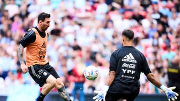 BILBAO, SPAIN - MAY 28: Lionel Messi and Emiliano Martinez of Argentina in action during a training session at San Mames Stadium Camp on May 28, 2022 in Bilbao, Spain. Argentina will face Italy in Wembley on June 1 as part of the Finalissima Trophy. (Photo by Juan Manuel Serrano Arce/Getty Images)