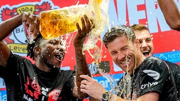 Leverkusen coach Xabi Alonso was swimming in beer after an incredible season with the team he led to their first Bundesliga title in club history.