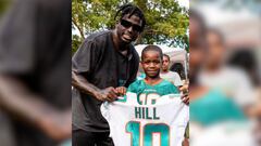A young boy went viral after he imitated Dolphins receiver Tyreek Hill and when Hill caught wind of it, he decided to surprise and challenge him to a race.