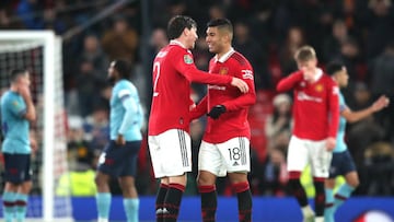 Manchester United's Casemiro and Victor Lindelof (left) celebrate victory after the final whistle in the Carabao Cup fourth round match at Old Trafford, Manchester. Picture date: Wednesday December 21, 2022. (Photo by Isaac Parkin/PA Images via Getty Images)