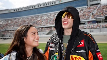 The comedian known for hooking up with famous women was caught kissing another on Sunday’s Daytona 500