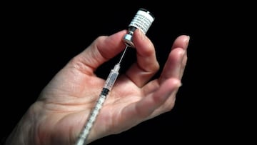 A nurse prepares a syringe of the Pfizer-BioNtech Covid-19 vaccine at a vaccination centre.